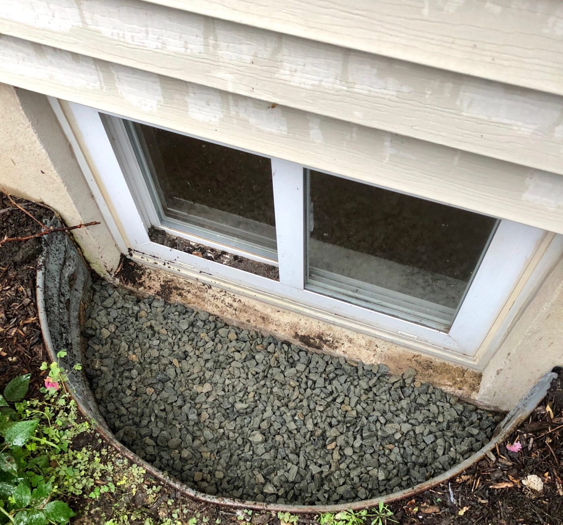 Basement window and window well